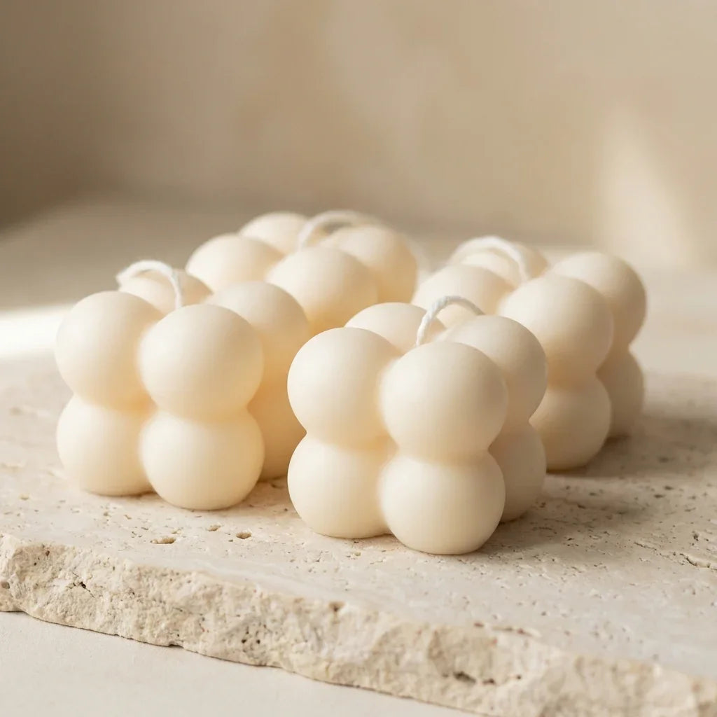 Close-up of a hand-poured soy wax petite bubble cube candles.