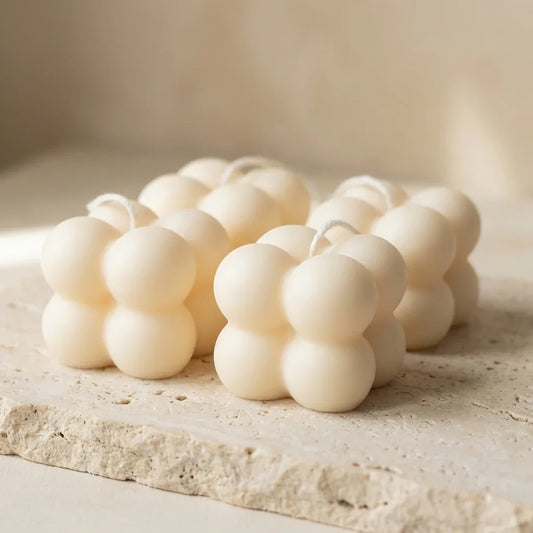 Close-up of a hand-poured soy wax petite bubble cube candles.