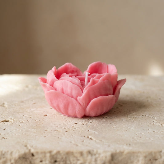 Floral rose heart candle styled beautifully as a breathtaking botanical accent for a romantic dinner setting.