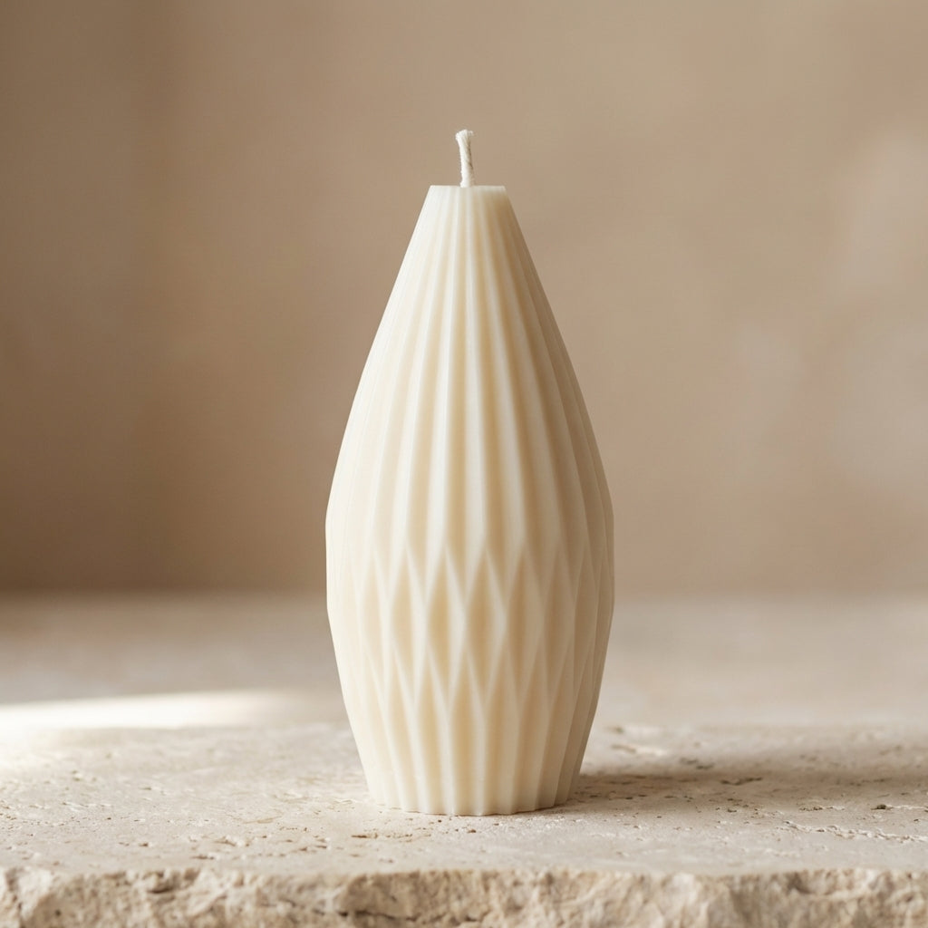 Geometric fluted drop candle styled beautifully as a sophisticated, modern statement centerpiece on a living room console.