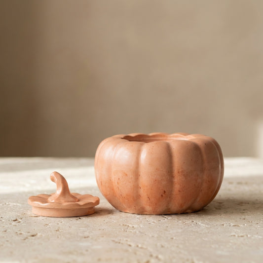 Pastel pumpkin jar styled beautifully as an elegant, cozy trinket box on an autumn-themed entryway console.