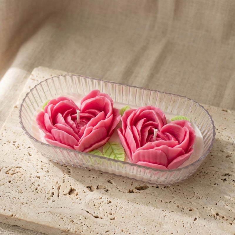 Beautiful two-wick rose heart centerpiece burning brightly, styled effortlessly as an elegant, romantic gift on a stylish bedroom vanity or dinner table.